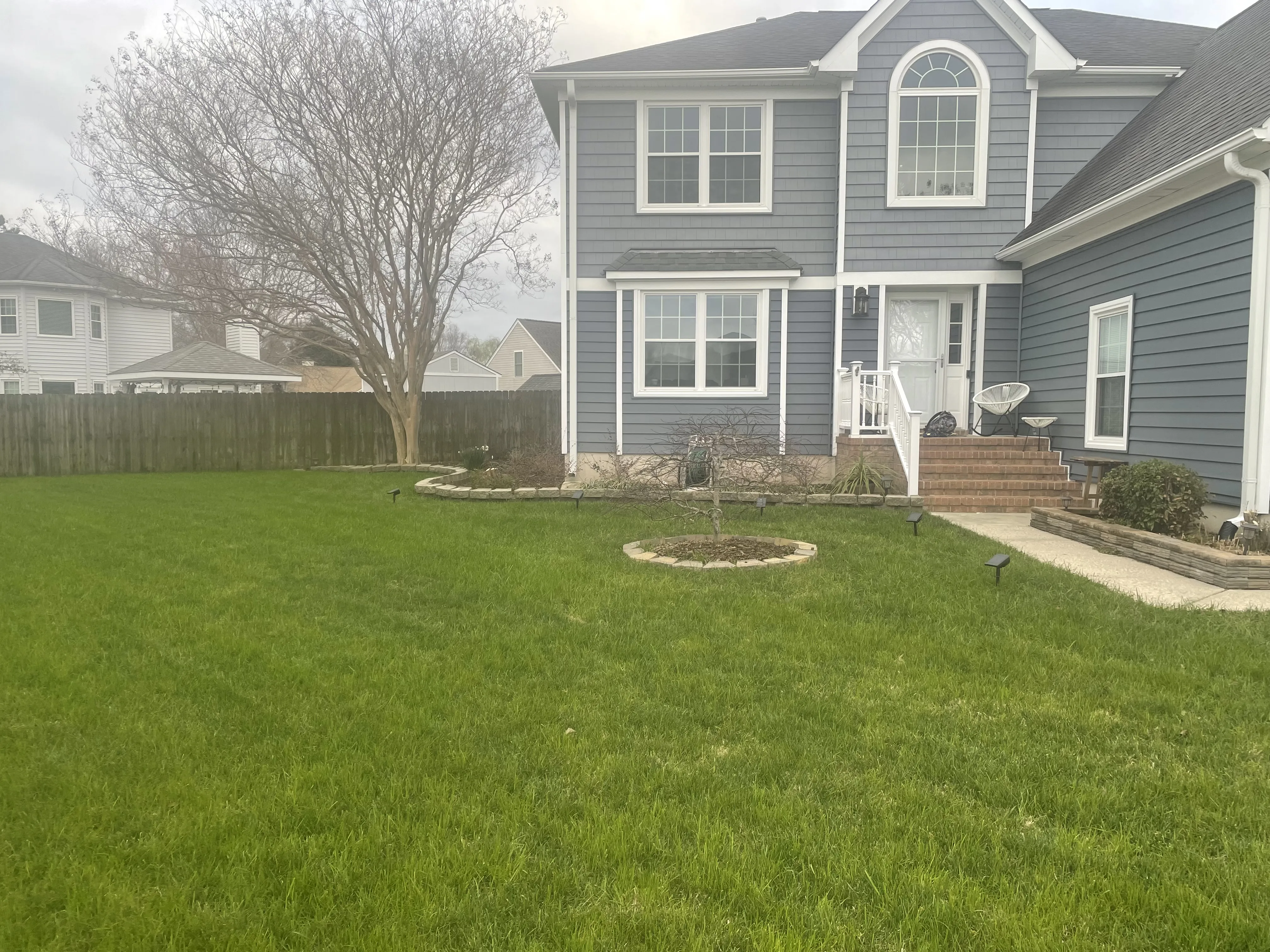 Residential home with green lawn